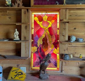image of stained glass window at Harmony Hollow House in Arizona