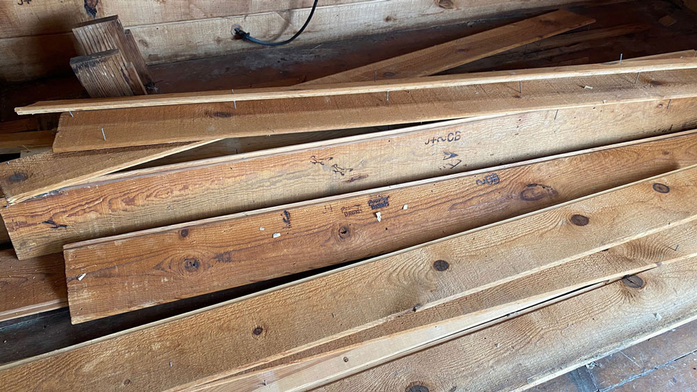 image of wood siding with brands at Harmony Hollow
