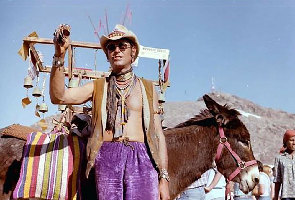 image of john woodjack at farmers market with jeffrey cross bells and donkey in 1973