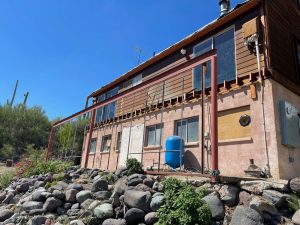 demolished veranda at Arizona Harmony Hollow house