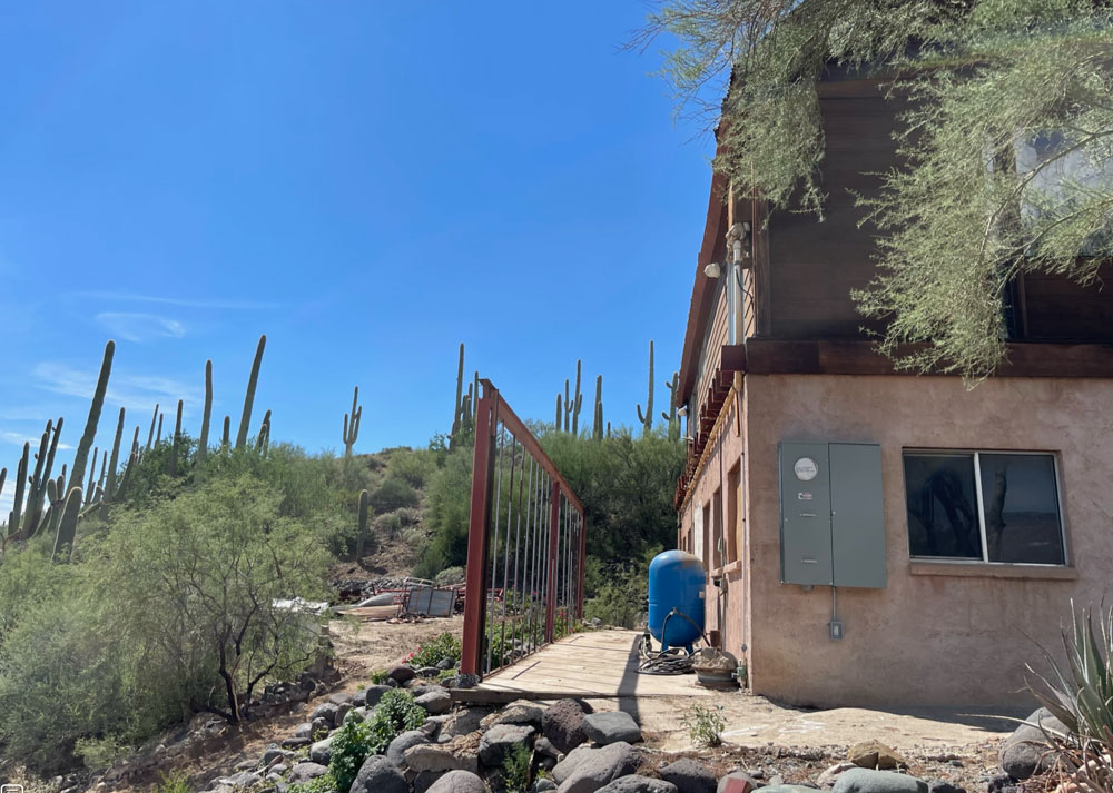 image of demolished veranda at Arizona Harmony Hollow house