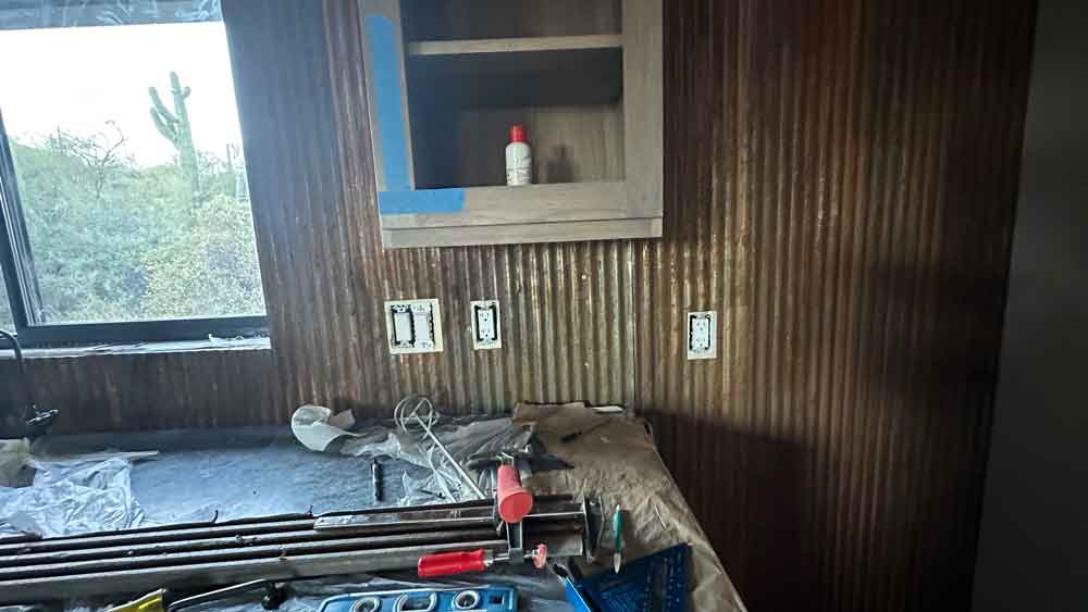 image of rusted corrugated metal installed on kitchen walls